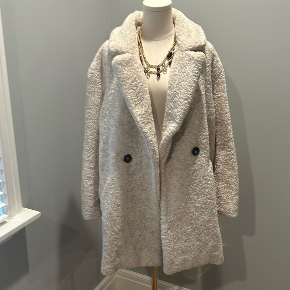 Mid -length faux fur jacket oversized look